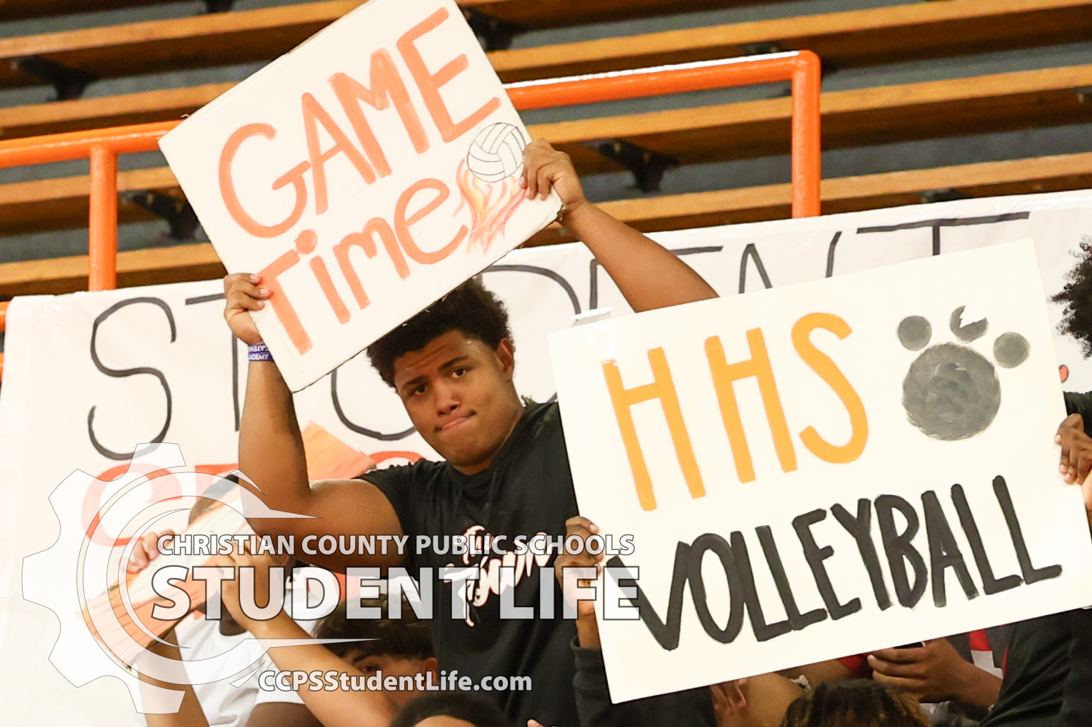 HHS Football Brings Tiger Spirit to Lady Tigers Volleyball